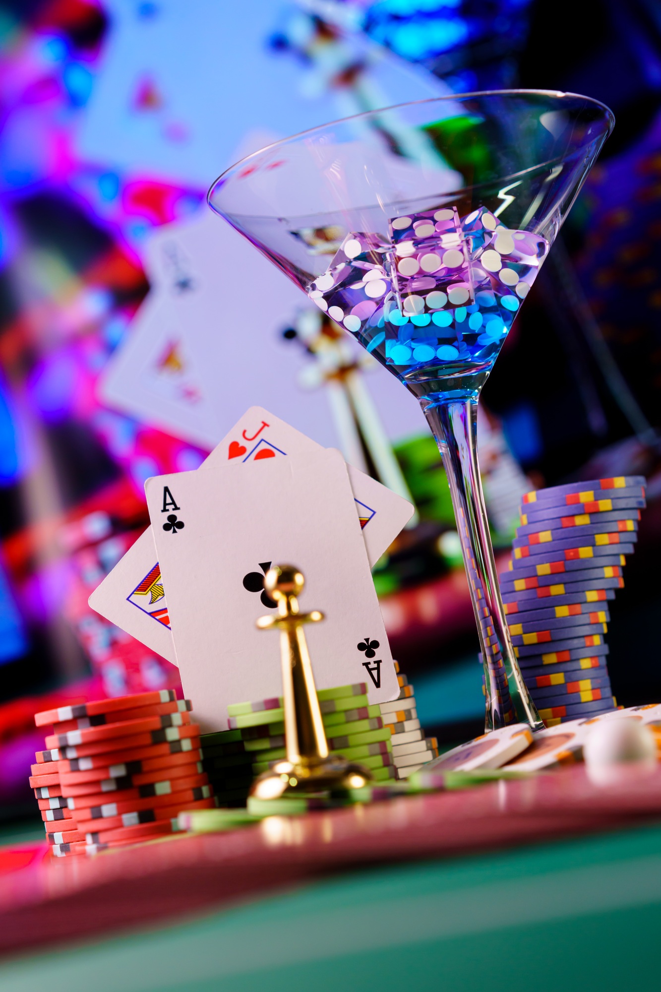 cocktail glass on the casino gambling table